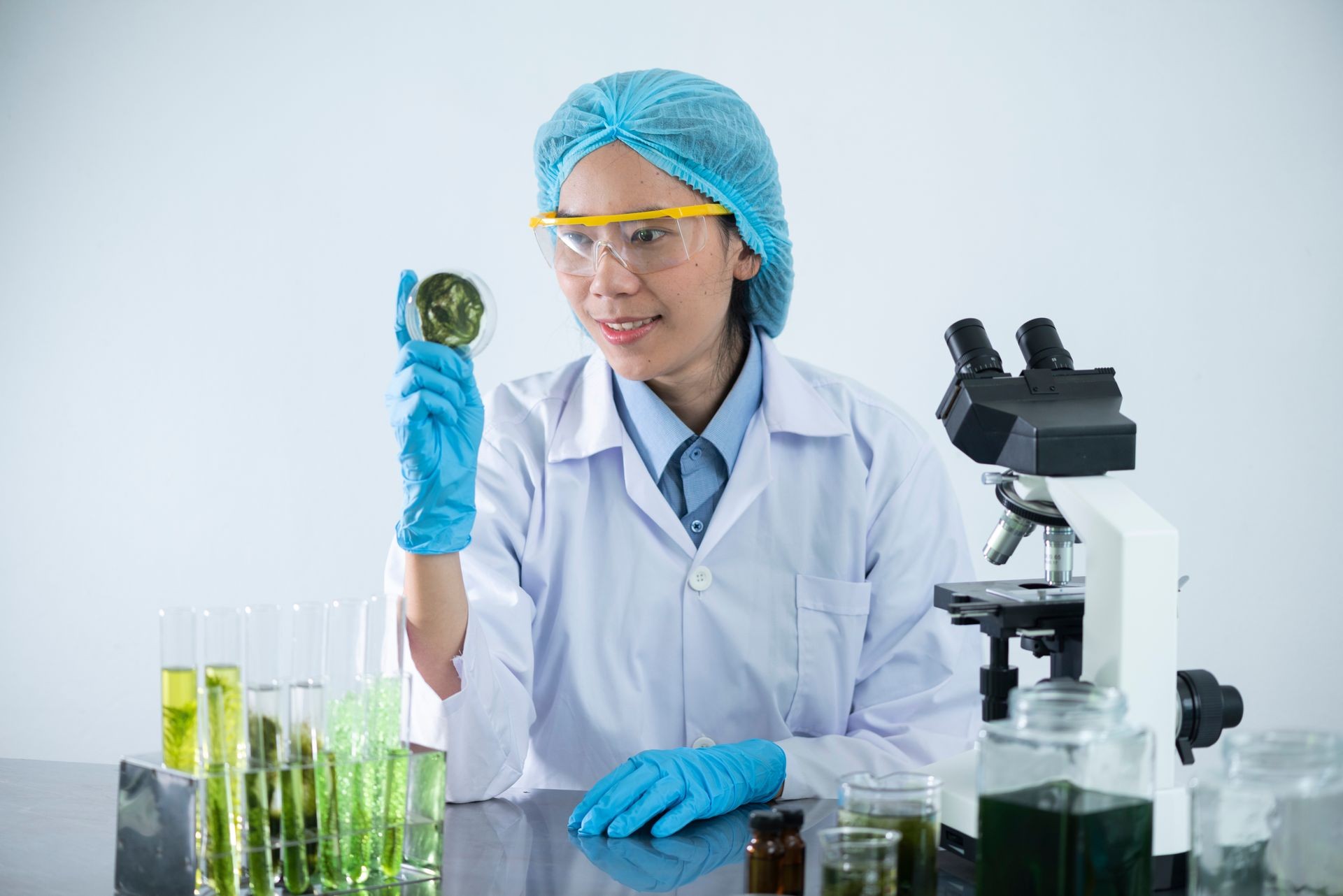 the scientist, dermatologist testing the organic natural cosmetic product in the laboratory, research and development beauty skincare concept